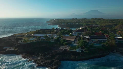 Drone video of big waves crashing at Devils Tears, dream beach with Mount Agung Stock Footage 316656788