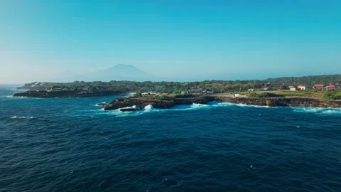 Drone video of big waves crashing at Devils Tears, dream beach with Mount Agung Stock Footage 316656832