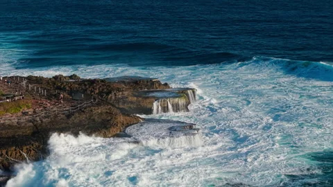 Drone video of big waves crashing at Devils Tears, dream beach a popular tourist Stock Footage 316657269