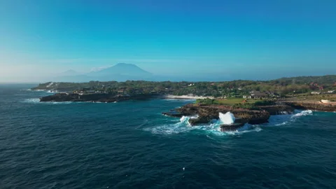 Drone video of big waves crashing at Devils Tears, dream beach with Mount Agung Stock Footage 316657449