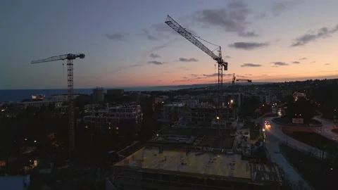 Drone video of a breathtaking flight around a hotel construction site on the Stock Footage 236984104