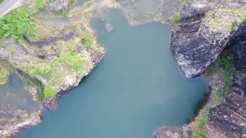 Drone video of capturing multiple lakes and passing through hill in wayanad Stock Footage 318833321