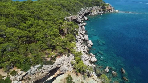 Drone video capturing the pristine Valley, Fethiye, featuring its tranquil be Stock Footage 280791486