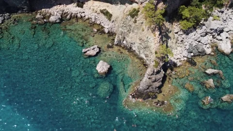 Drone video capturing the pristine Valley, Fethiye, featuring its tranquil be Stock Footage 280791488