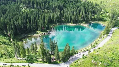 Drone video Carezza lake Dolomites Italy europe Stock Footage 302584960