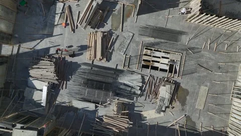 Drone Video of Construction Yard with Planks and Rebar Stock Footage 342826012