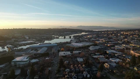 Drone video during beautiful Sunset capturing The Olympics from North Seattle Stock Footage 263691004