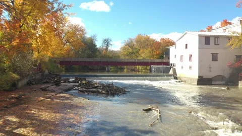 Drone video, flying backward at very low angle, close to the waterfall of t.. Stock Footage 256080840