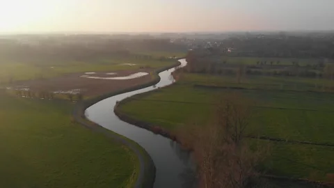 Drone video flying over a river in the landscape of flanders belgium Stock Footage 169240182