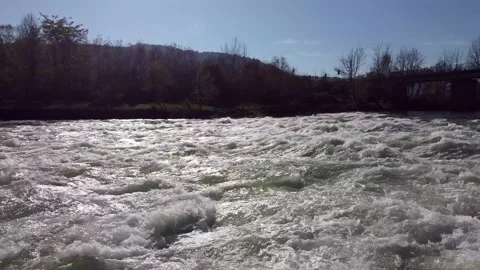 Drone video flying over rough river rapids Stock Footage 142542401