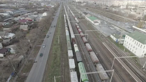 Drone video. freight and passenger trains following the railway tracks Stock Footage 219686804