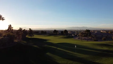 Drone Video on Golf Course Overlooking Las Vegas Strip at Golden Hour Stock Footage 256913336
