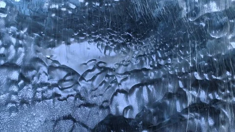 Drone video from an Ice Cave in Iceland with blue and green crystal ice Stock Footage 88082012