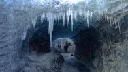 Drone Video From An Ice Cave In Iceland With Blue And Green Crystal Like Ice Stock Footage