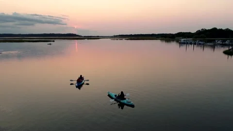Drone Video of Kayaking During Sunset in Harbor Stock Footage 167881630