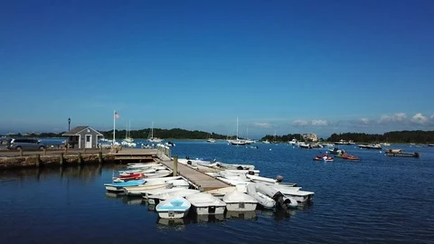 Drone video low flying over boat dock with kayaks in background 動画素材 92966028