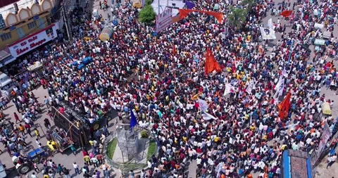 Drone video of Massive crowd dances during Ganesha immersion celebration Stock Footage 340084188