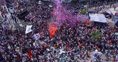 Drone video of Massive crowd dances during Ganesha immersion celebration Stock Footage 340084210