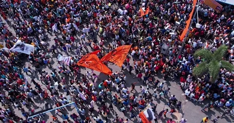 Drone video of Massive crowd dances during Ganesha immersion celebration Stock Footage 340084226