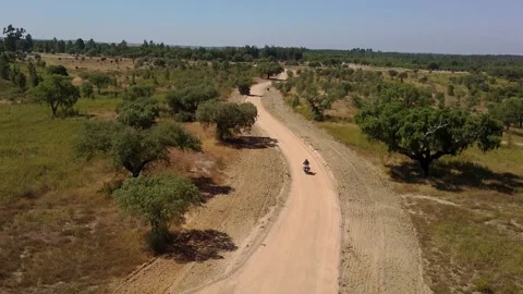Drone video motorcycle trail through the countryside Stock Footage 260349982