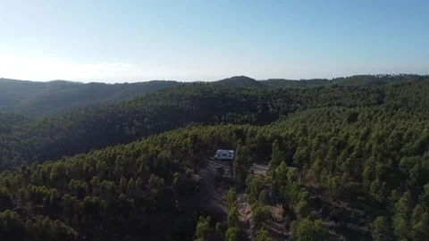 Drone video motorhome in the forest Stock Footage 260094017