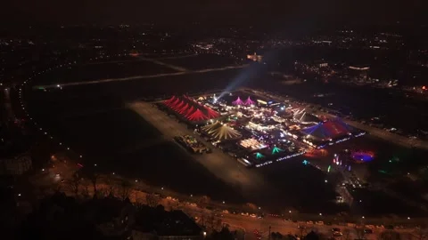 Drone video at night over Munich Theresienwiese, Germany. Illuminated festival Stock-Footage 325225669