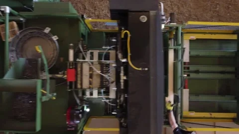 Drone Video of Pallet Building Machine Stock Footage 201625002