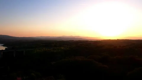 Drone video pan on Arno river railine bridge Tuscany Sunset Italy Stock Footage 250093770