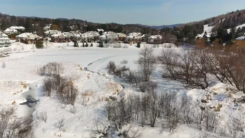 Drone video panning down slowly showing the beautiful winter landscape Stock Footage 164420693