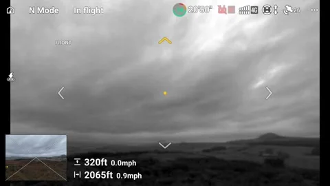 Drone video of pilot’s controller view while creating a hyperlapse on a windy da Stock Footage 328150276