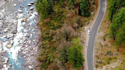 Drone video road in the forest and blue river cinematic shot Stock Footage 110206796