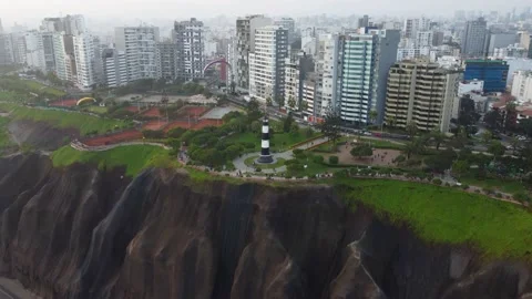 Drone video slowly tilting camera up revealing popular light house in Video stock 196223632