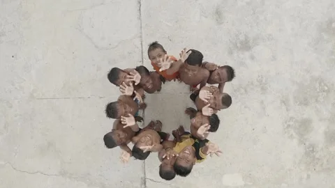 DRONE VIDEO SLOWMO CHILD WAVE HAND FLAT PROFILE COLOR Stock Footage 238738690