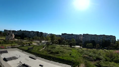 Drone video of a small town with green trees and tall buildings Stock Footage 337652062