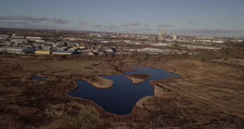 Drone video of Teesside Barrage nature reserve showing nature and industry Stock Footage 131079129