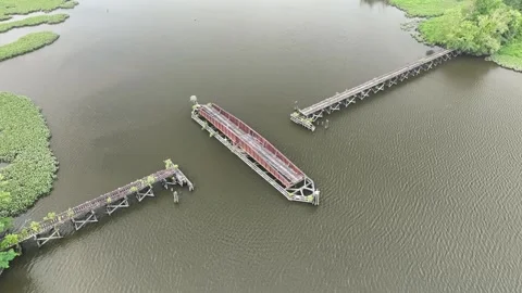 Drone video tracking around an old railroad draw bridge Maryland Eastern Shore 스톡 동영상 249853021
