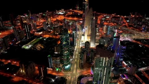Drone video of traffic in the streets of Kuwait City urban growth and progress Stock Footage 266980023