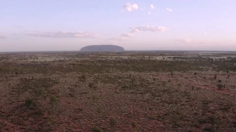 Drone video of Uluru in background Stock Footage 130783266