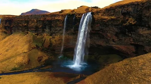Drone video of the waterfall in the mountains	 Stock Footage 252435730