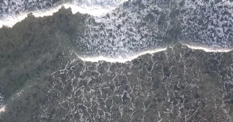 Drone video of waves hitting the beach on the Indian Ocean on the Swahili coast, Stock Footage 119836459