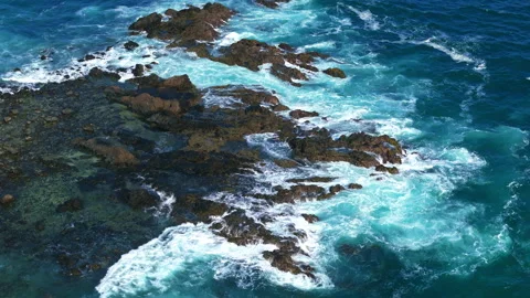Drone Video of Waves Hitting Rocks Stock Footage 284177565