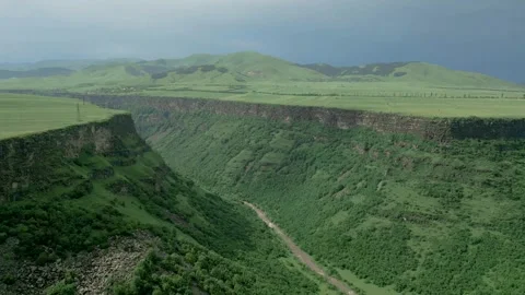 Drone video. Wooded mountain, deep stony canyon, Dzoraget River in Armenia. Stock Footage 253423232