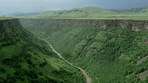 Drone video. Wooded mountain, deep stony canyon, Dzoraget River in Armenia. Stock Footage 253424136