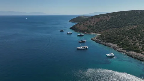 A drone video of yachts in unique blue waters Stock Footage 235327925