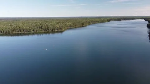 Drone view 360 degree pan of lake and forest in Manitoba in the summer Stock Footage 203231282