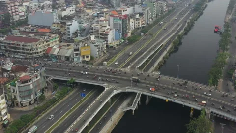 Drone view 4K footage of Ho Chi Minh cityscape and morning traffic Stock Footage 150553281