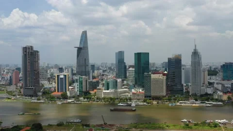 Drone view 4K footage of Ho Chi Minh city beside riverbank, Vietnam Stock Footage 151161289