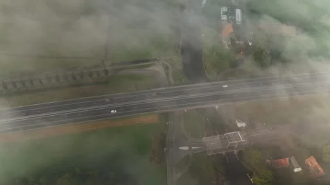 Drone View in 4K: Highway Emerging from Low Fog, Netherlands, October 2025 Stock Footage 318238577