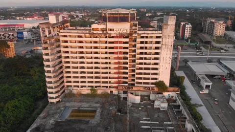 Drone view of an abandoned hotel close to highway in Chiang Mai, Lampang Road Stock Footage 237819328