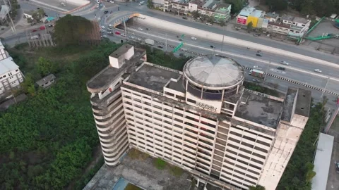Drone view of an abandoned hotel close to highway in Chiang Mai, Lampang Road Stock Footage 237819340